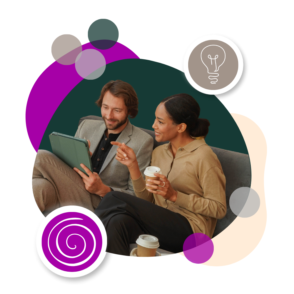 man and woman professionals looking at a tablet computer to creatively deploy an SIY Global license