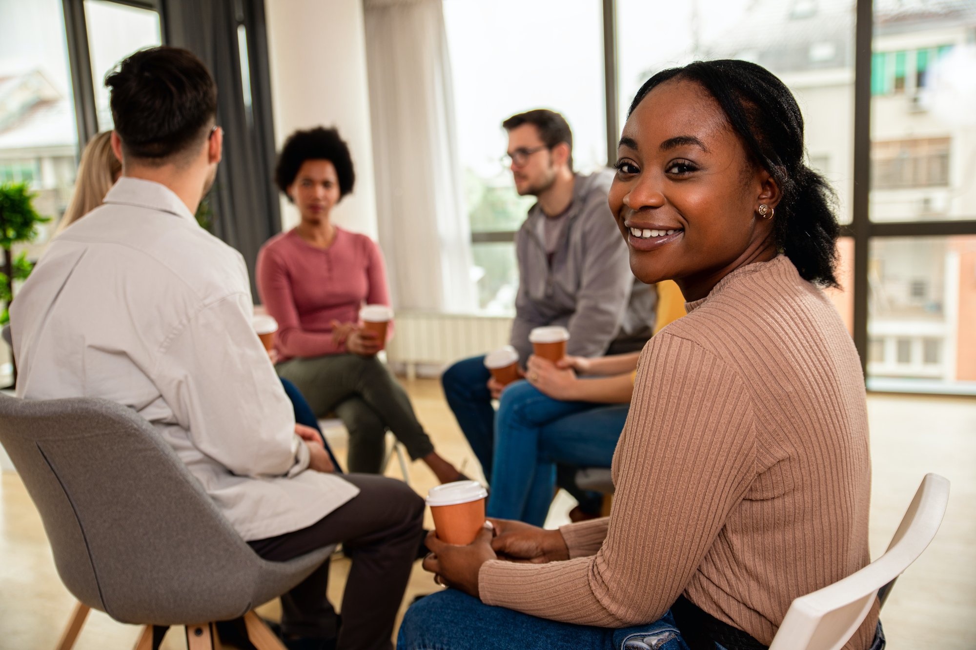 Office workers gathered with cofee