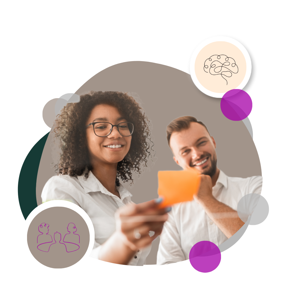 Innovation - two people doing design thinking exercise with sticky notes